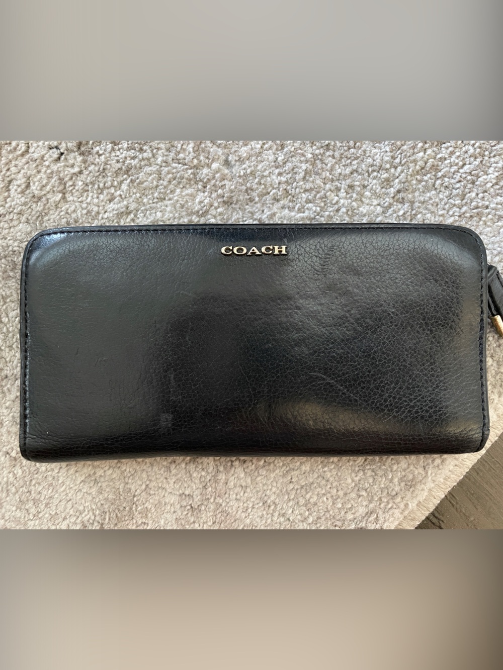 Coach Black Leather Zip-Around Women’s Wallet with Gold Logo